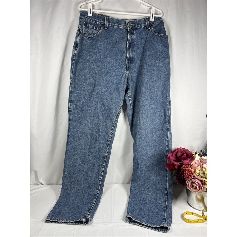 Vintage Levi's 550 Relaxed Fit Tapered Leg Women's size 14 Mid LBlue Denim jeans